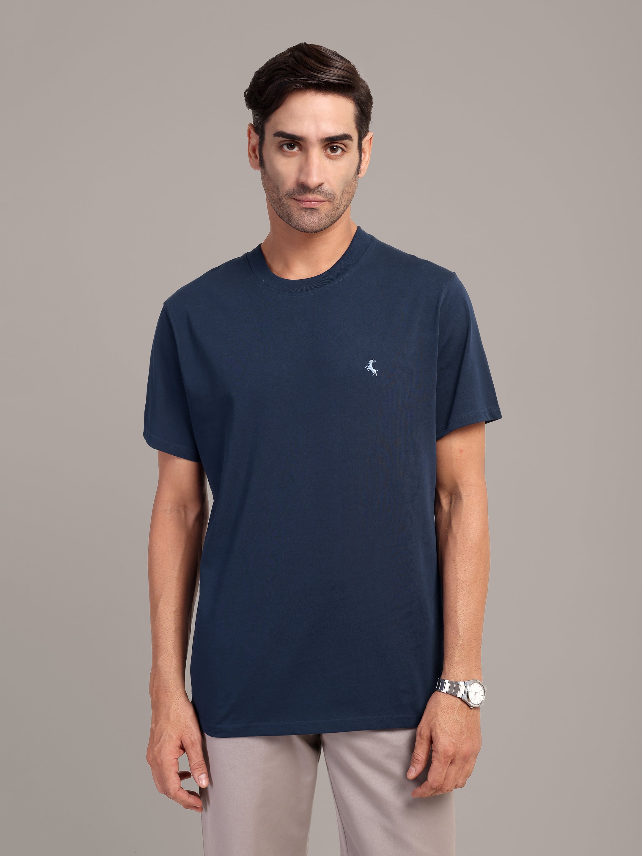 RARE STAG Navy Logo Jersey Crewneck T-Shirt – front view on model, studio grey background
