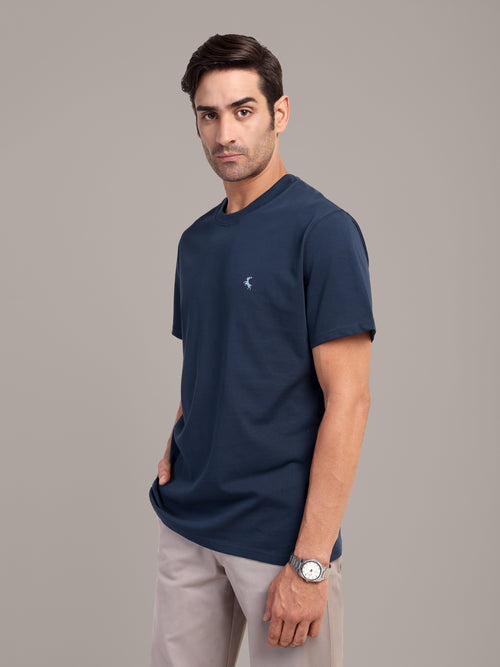 RARE STAG Navy Logo Jersey Crewneck T-Shirt – three-quarter front view on model