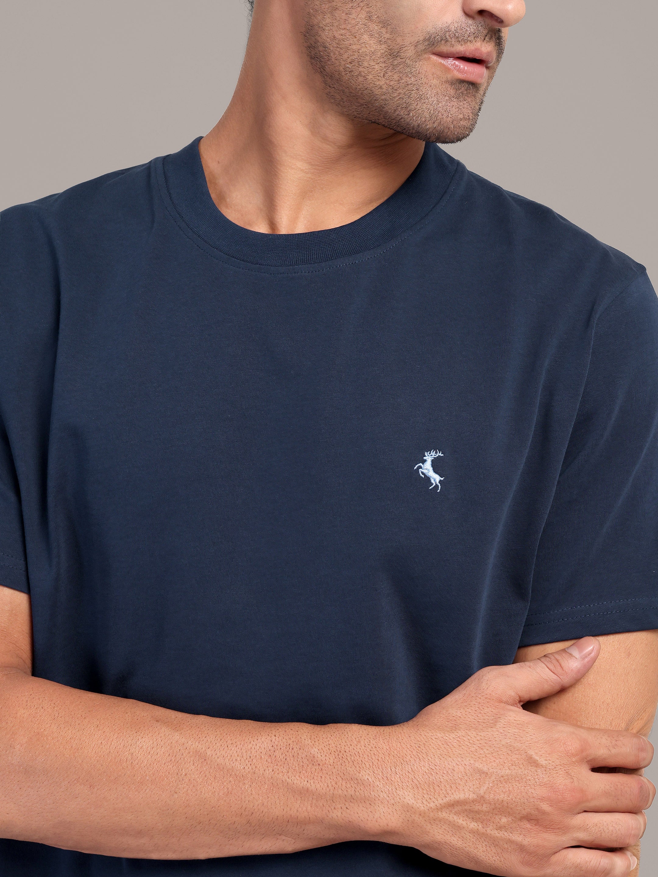 RARE STAG Navy Logo Jersey Crewneck T-Shirt – close-up of tonal logo mark on chest