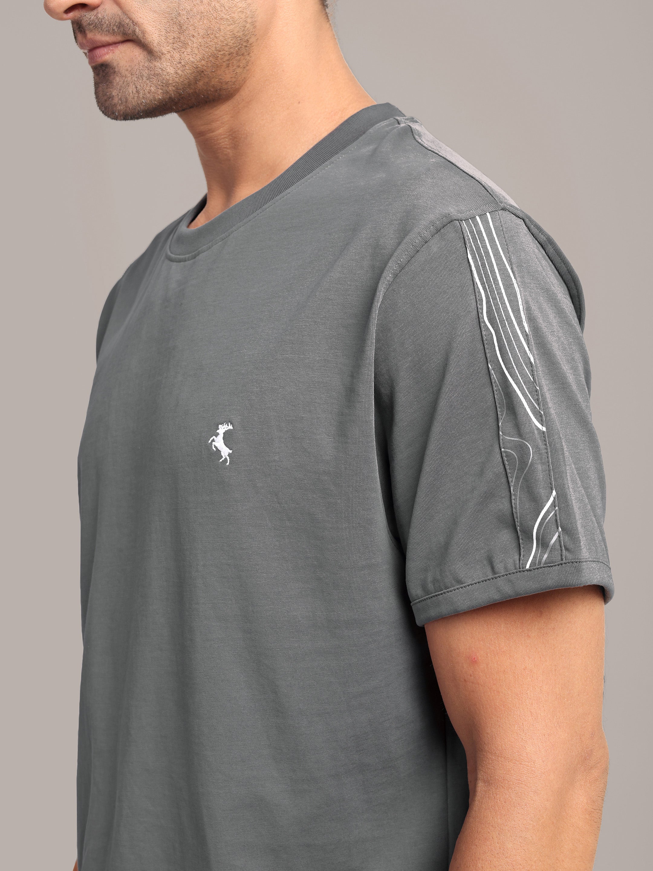 RARE STAG Pressure Line Jersey Crewneck T-Shirt – side view closeup showing left sleeve Pressure Line graphic and chest stag embroidery